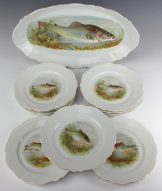 An early 20th Century Austrian fish service comprising oval serving plate and 9 dinner plates 