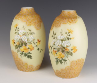 A pair of Victorian opalescent glass oviform vases decorated with flowers and scroll decoration 26cm 
