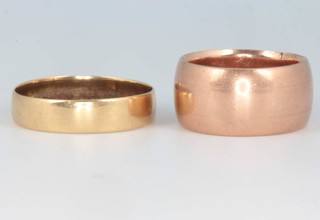 A 9ct yellow gold wedding size J, 7 grams and an 18ct yellow gold wedding band size O 1/2, 2.2 grams