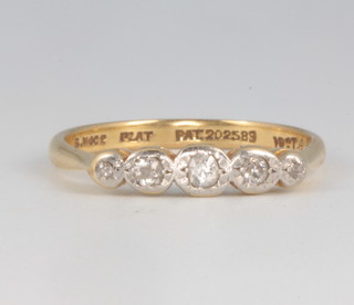 An 18ct yellow gold 5 stone diamond ring size N 2.3 grams 