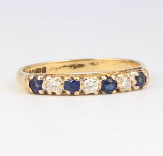 A 9ct yellow gold diamond and sapphire ring size O 