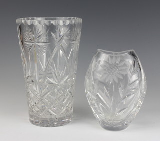 A cut glass vase decorated with flowers 16cm, a cylindrical tapered ditto 22cm 
