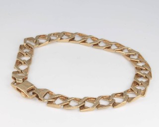 A 9ct yellow gold bark finish flat link bracelet 13.3 grams
