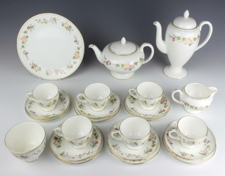 A Wedgwood Mirabelle tea and coffee set comprising teapot, coffee pot and lid, milk jug, sugar bowl, 6 tea cups, 6 saucers, 6 side plates, 1 sandwich plate