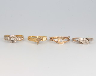 Two 18ct yellow gold rings size K, 4 grams and two 9ct rings size N, 2 grams
