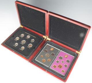 A cased double proof coin set and a ditto enamelled decimal and pre-decimal coin set 