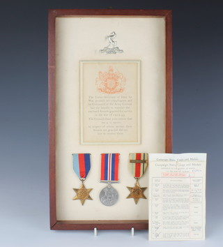 A World War Two group 1939-45 Africa Star with First Army bar and War medal mounted and framed to Private A G Martin together with cap badge, posthumously awarded 