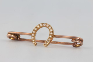 A 9ct yellow gold seed pearl horseshoe bar brooch 36mm 2 grams gross