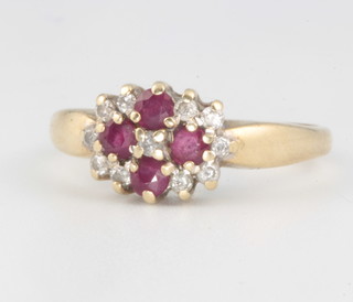 A 9ct yellow gold ruby and diamond cluster ring size M 2.3 grams gross