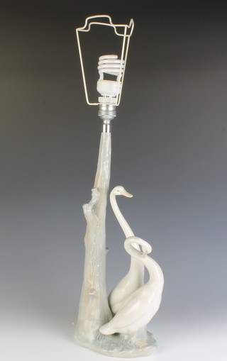 A Nao table lamp with 2 geese beside a tree 44cm 