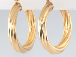 A pair of 9ct yellow gold hollow hoop earrings, 2.4 grams 