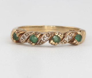 A 9ct yellow gold diamond and emerald set ring size L 1.7 grams gross