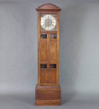 An Edwardian Art Nouveau 8 day striking longcase clock with 32cm square silvered dial with gilt metal spandrels, contained in an oak case 204cm h  