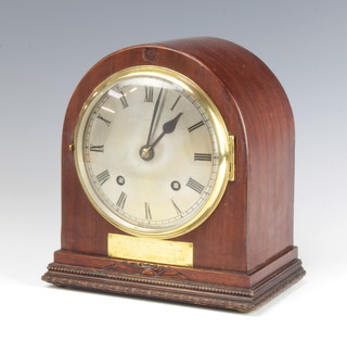 Of military interest, a 1930's striking mantel clock with silvered dial contained in an arched mahogany case with presentation plaque RSM R Holliday MM, mark of esteem and appreciation by members of the Sergeants Mess 3rd London Regt. RF 1930 