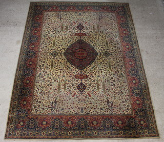A green and brown floral pattern machine made Persian style carpet with central medallion 364cm x 278cm 