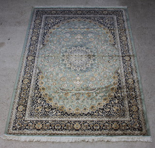 A green ground and floral pattern Kashan style Belgian cotton carpet with central medallion 280cm x 200cm 
