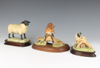 A Border Fine Arts figure of an English black faced sheep on a wooden base 14cm (ear chipped), a ditto of a fox chasing a rabbit on a tree trunk 13cm, a ditto of a Jack Russell chasing a rabbit 7cm and minor items 