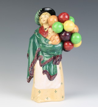 A Royal Doulton figure - The Balloon Seller HN 583 22cm 