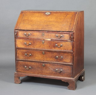 A Georgian oak bureau, the fall front revealing a fitted interior above 4 long graduated drawers with brass swan neck handles, raised on bracket feet 107cm h x 91cm w x 50cm d 