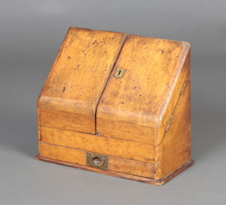 A Victorian light oak wedge shaped stationery box with stepped interior, the base fitted a drawer 25cm h x 29cm w x 14cm d 