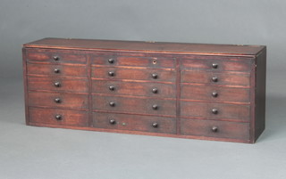 A Georgian mahogany table top chest with crossbanded hinged lid, fitted 3 compartments above 12 drawers with tore handles 29cm h x 83cm w x 20cm d