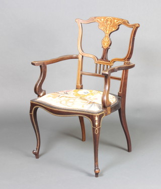 An Edwardian inlaid mahogany open arm chair with vase shaped slat back and Berlin woolwork seat, raised on cabriole supports 