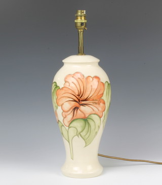 A modern Moorcroft oviform table lamp the beige ground decorated with hibiscus 33cm 