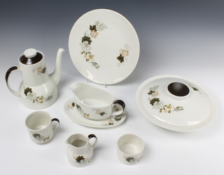 A Royal Doulton Westwood pattern coffee/dinner service comprising 6 coffee cups, coffee pot, milk jug, sugar bowl, 6 plates, 11 dinner plates, 6 side plates, 2 tureens and covers, 6 dessert bowls, 2 sauce boats and stands 6 saucers