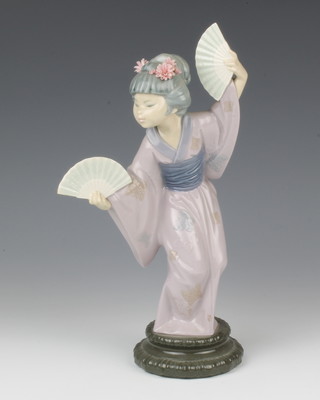 A Lladro figure of a Japanese dancer holding fans 30cm 