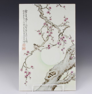 A 20th Century Chinese porcelain plaque decorated with birds in a prunus tree with script 39cm x 25cm 