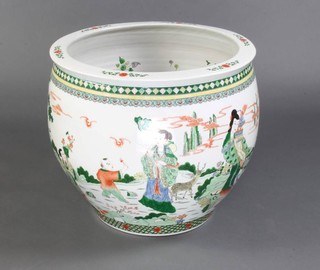 A famille vert jardiniere the interior decorated with fish, the exterior with figures in an extensive landscape 50cm 
