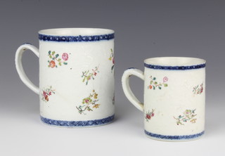 An 18th Century Chinese moulded mug with polychrome floral decoration 11cm, a smaller ditto 8cm 