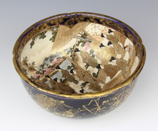 A Japanese Satsuma deep bowl decorated with figures in a pavillion garden, the exterior blue ground with gilt, floral and bird decoration 18cm 