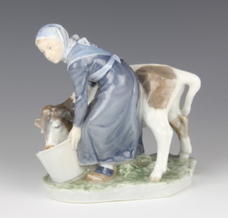 A Royal Copenhagen figure of a milkmaid 7799 17cm 