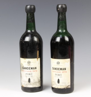 Two bottles of 1970 Sandeman vintage port (1 bottle is low on the neck) 