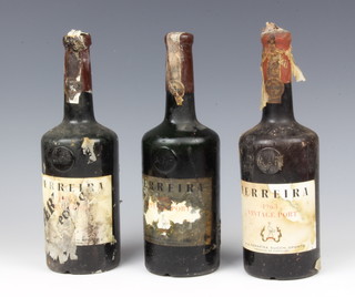 Three bottles of Ferreira vintage port one 1963 and two 1966 - all low on the neck 

