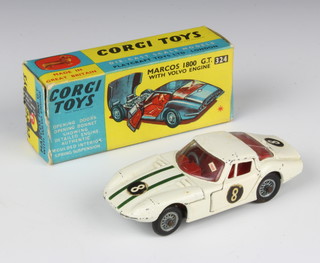 Corgi, a boxed 324 white Marcos 1800 G.T with green racing stripes and No. 8 decals to sides, front and back