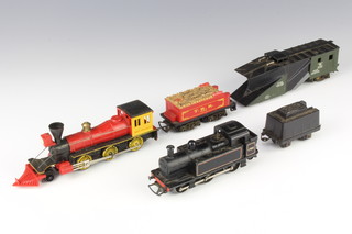 A Triang R52 tank engine, a Triang O gauge R233 Davy Crocket 8 wheeled locomotive with tender, a Triang R138 snow plough 