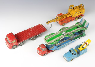 A Dinky Toys no.972 20 ton lorry mounted crane, a Budgie towing tender and breakdown truck, a Triang model of an AEC Major 8 together with a Corgi big Bedford tractor unit and Carrimore car transporter 
