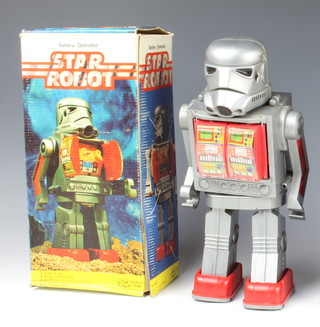 A 1970's "Star Robot" plastic battery operated robot by Dynamic Toys Hong Kong. Unlicensed in the form of a Star Wars Stormtrooper. Boxed
