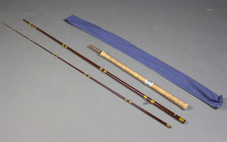 A Hardy Fred Taylor trotting fishing rod 11'3", with detachable butt and blue cloth bag