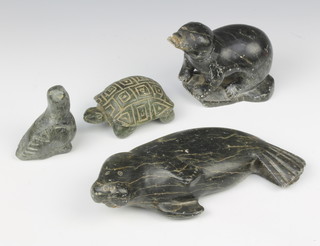 A collection of Inuit carved hardstone figures, reclining walrus 5cm x 19cm x 9cm the base incised JAC E E9730, turtle base marked CNDORO 4cm x 9cm x 6cm, bird 7cm x 5cm x 3cm, seal? 10cm x 9cm x 6cm 