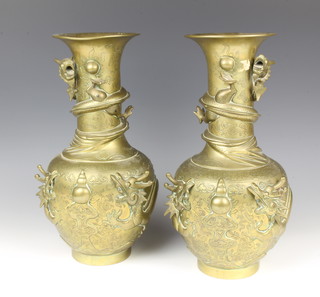 A pair of Japanese polished bronze club shaped vases decorated dragons, the base with seal mark 34cm 