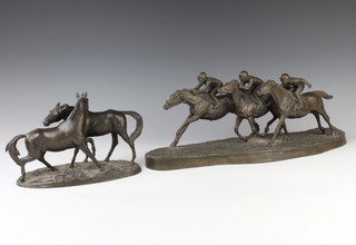A bronzed figure group of 3 race horses raised on a shaped base 19cm x 25cm x 14cm together with a bronzed figure group of 2 standing horses 16cm x 22cm x 11cm