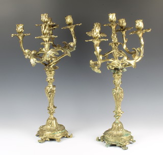 An impressive pair of Rococo style gilt metal 5 light candelabrum 62cm h x 31cm diam. 