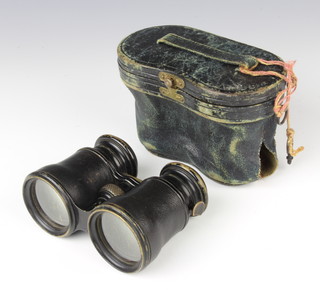 A pair of Edwardian triple optic field glass marked Theatre, Field Marine by Lemaire, France, the adjusting wheel to the side engraved B and marked 3349 complete with leather carrying case 