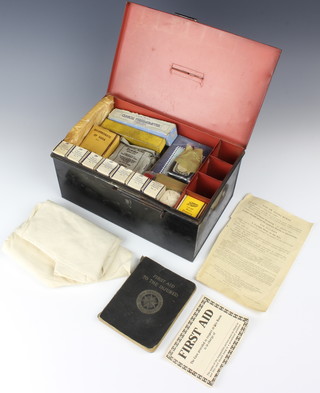 A 1920/30's Boots first aid tin containing a collection of various dressings etc 13cm x 27cm x 17cm 