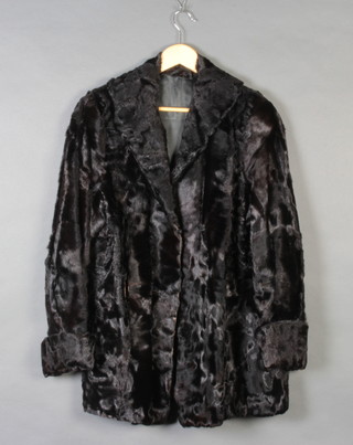 A lady's black Persian lamb quarter length jacket