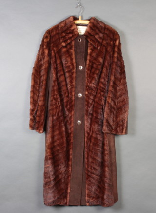 A lady's full length brown fur and suede coat by B Manock of Durban 