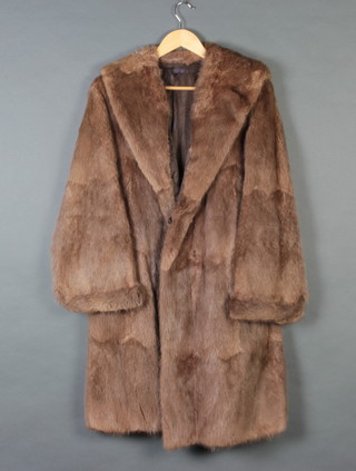 A lady's full length dyed fur coat 